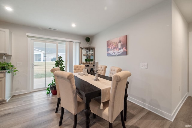 2751 Sand Hollow Dr, Lebanon, IN 46052 - dining area with recessed lighting, baseboards, light wood finished floors, and visible vents