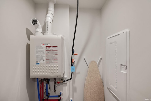 2751 Sand Hollow Dr, Lebanon, IN 46052 - utility room featuring tankless water heater