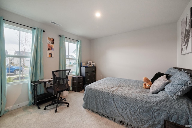 2751 Sand Hollow Dr, Lebanon, IN 46052 - bedroom with light carpet and visible vents