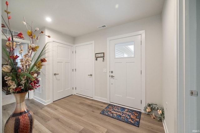 2751 Sand Hollow Dr, Lebanon, IN 46052 - entryway featuring light wood finished floors, baseboards, and visible vents