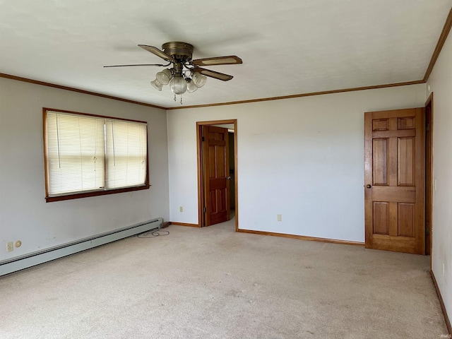 spare room with baseboards, carpet, a baseboard radiator, a ceiling fan, and ornamental molding