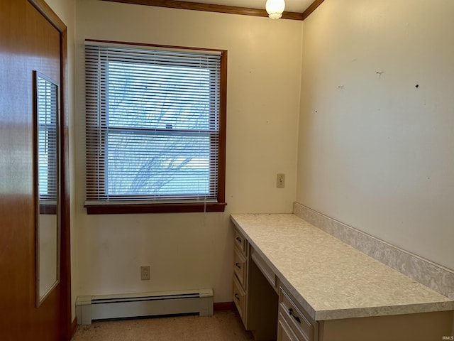 bathroom featuring a baseboard heating unit and a healthy amount of sunlight