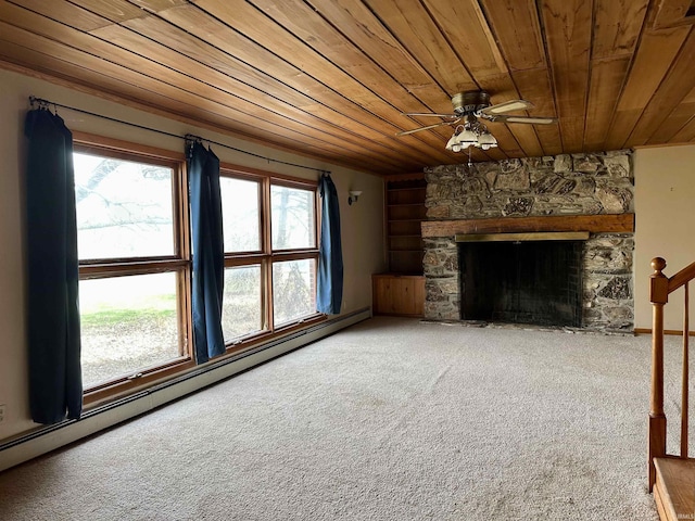 unfurnished living room featuring carpet flooring, baseboard heating, a ceiling fan, wooden ceiling, and a fireplace