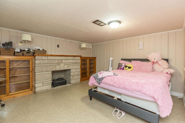 bedroom with visible vents and ornamental molding