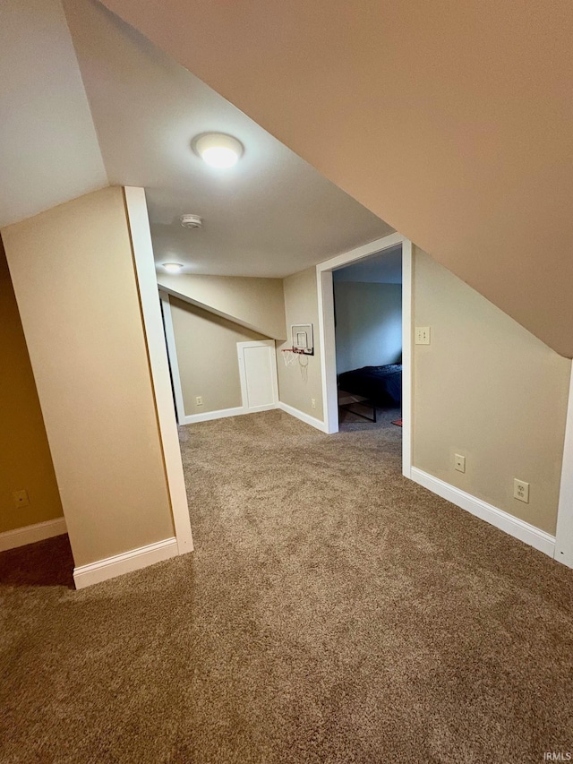 1951 Indian Mounds Blvd, Evansville, IN 47715 - bonus room featuring carpet floors, baseboards, and vaulted ceiling