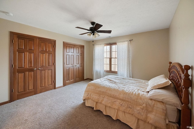 4277 S 100 W, Williamsport, IN 47993 - bedroom with baseboards, ceiling fan, carpet flooring, and a textured ceiling