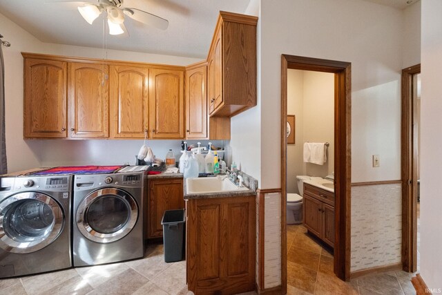 4277 S 100 W, Williamsport, IN 47993 - clothes washing area with a sink, cabinet space, washer and dryer, and ceiling fan