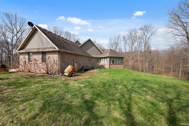 4277 S 100 W, Williamsport, IN 47993 - view of side of property with a lawn and brick siding