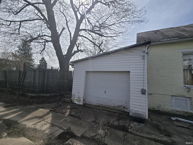 garage featuring fence