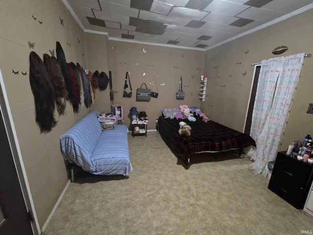 carpeted bedroom featuring baseboards and ornamental molding