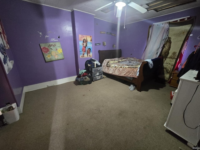 bedroom featuring carpet flooring, a ceiling fan, and baseboards