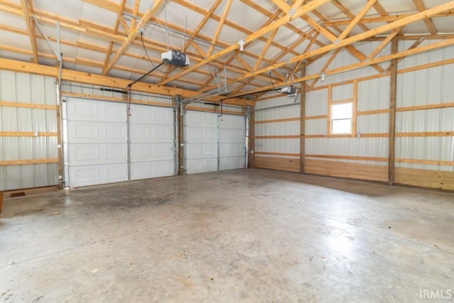 2645 S Greensboro Pike, New Castle, IN 47362 - garage featuring metal wall and a garage door opener