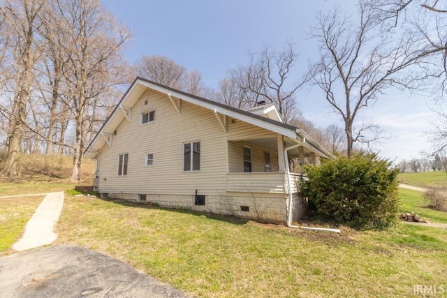 2645 S Greensboro Pike, New Castle, IN 47362 - view of home's exterior with a chimney and a yard