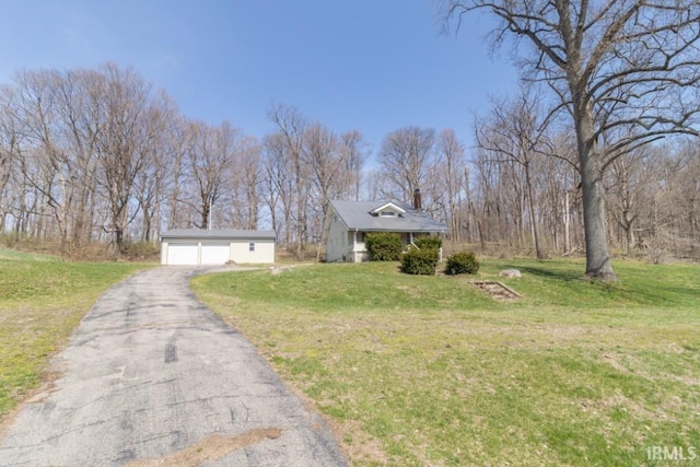 2645 S Greensboro Pike, New Castle, IN 47362 - view of front facade featuring an outbuilding, a front yard, and a garage