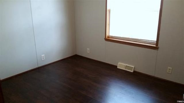 905 Stewart Ave, Evansville, IN 47715 - empty room featuring dark wood finished floors