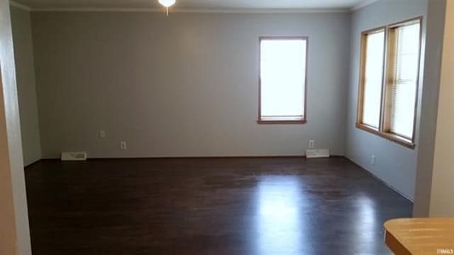 905 Stewart Ave, Evansville, IN 47715 - unfurnished room featuring dark wood-style flooring and ornamental molding