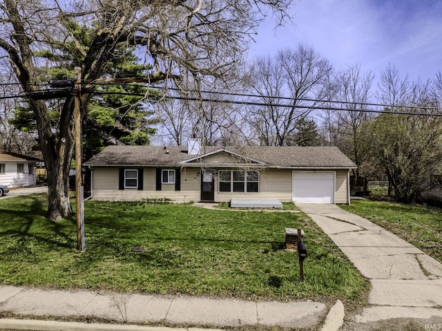 ranch-style home with a garage, a front lawn, and concrete driveway