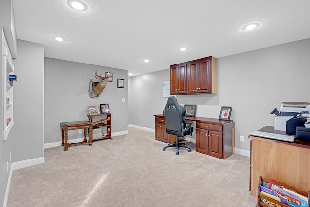 home office with light carpet, baseboards, and recessed lighting