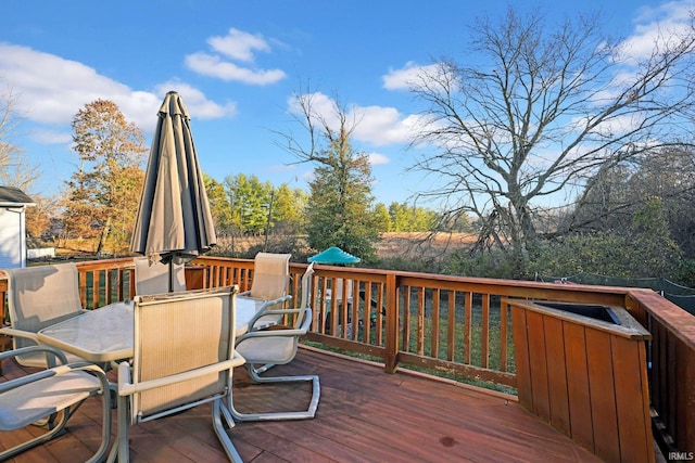 deck featuring outdoor dining space