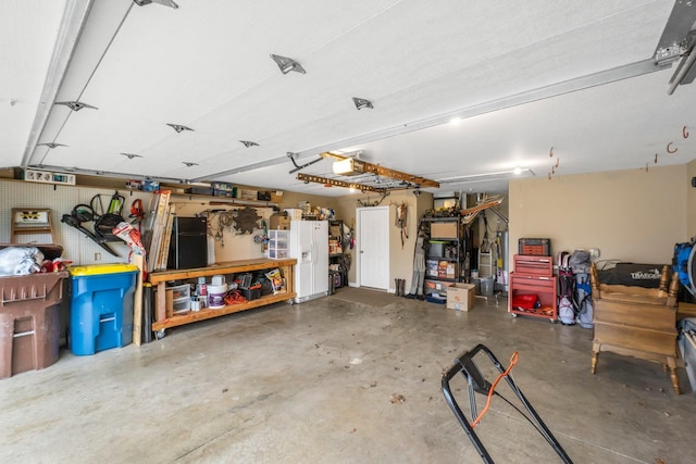 garage featuring a workshop area