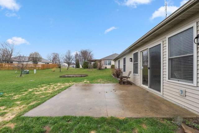 view of patio featuring fence