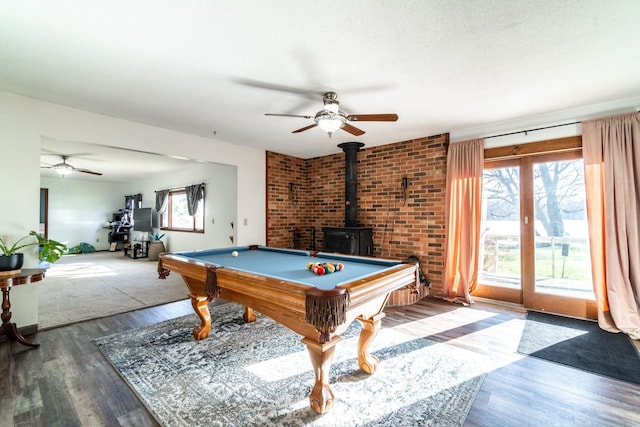 2680 S 390 W, Pleasant Lake, IN 46779 - rec room with wood finished floors, pool table, a wood stove, and ceiling fan