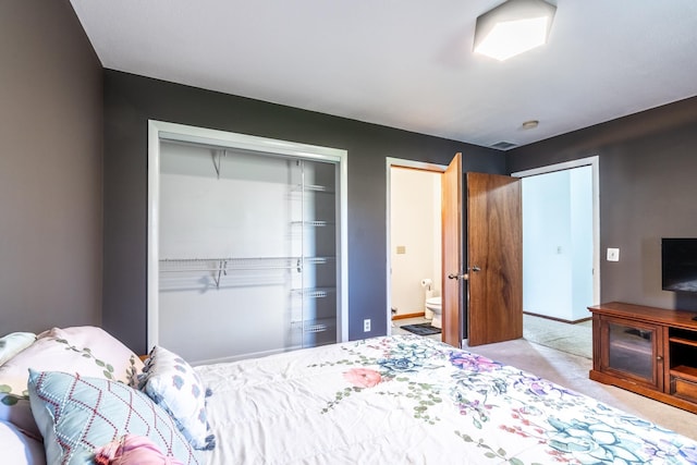 2680 S 390 W, Pleasant Lake, IN 46779 - bedroom featuring baseboards, carpet floors, visible vents, and ensuite bath