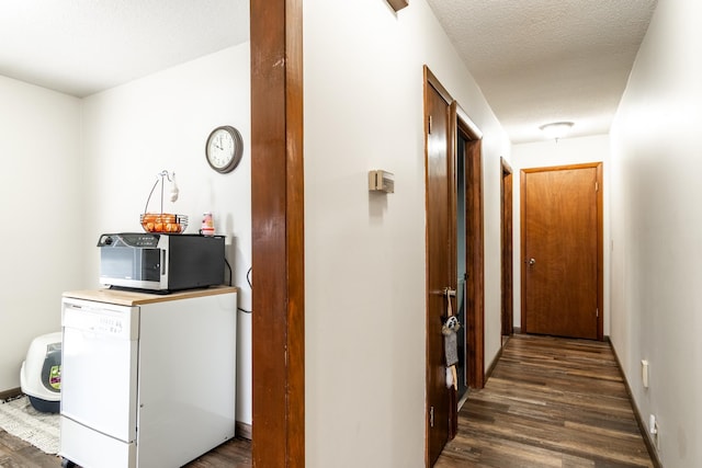 2680 S 390 W, Pleasant Lake, IN 46779 - hallway featuring a textured ceiling and dark wood finished floors