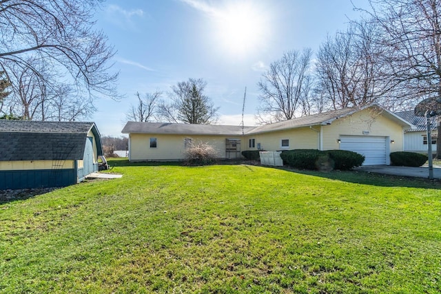 2680 S 390 W, Pleasant Lake, IN 46779 - view of front facade with an outbuilding, a garage, and a front yard