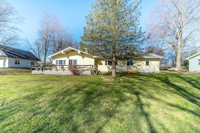 2680 S 390 W, Pleasant Lake, IN 46779 - rear view of house featuring a lawn and a deck