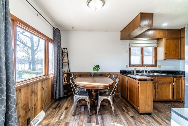 2680 S 390 W, Pleasant Lake, IN 46779 - kitchen with dark wood finished floors, brown cabinets, and visible vents
