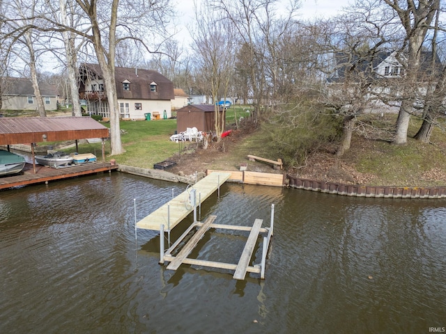 5255 E Bay Front Ct, Monticello, IN 47960 - view of dock with a lawn, boat lift, and a water view