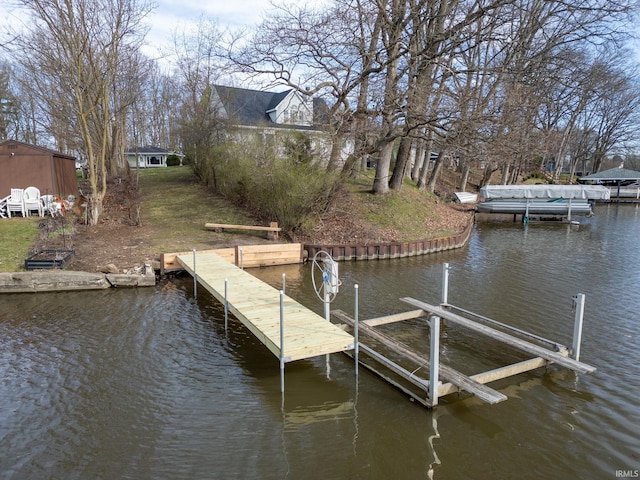 5255 E Bay Front Ct, Monticello, IN 47960 - view of dock featuring boat lift and a water view