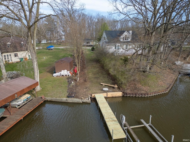 5255 E Bay Front Ct, Monticello, IN 47960 - view of dock featuring a water view, boat lift, and a yard