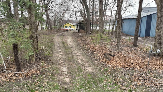 view of road featuring driveway