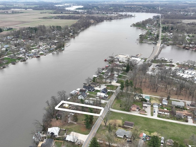 aerial view featuring a residential view and a water view