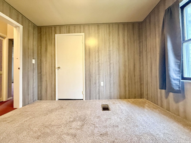 603 N Maple St, Converse, IN 46919 - spare room featuring visible vents and carpet floors
