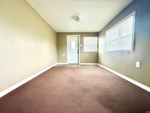 603 N Maple St, Converse, IN 46919 - spare room featuring carpet flooring and baseboards