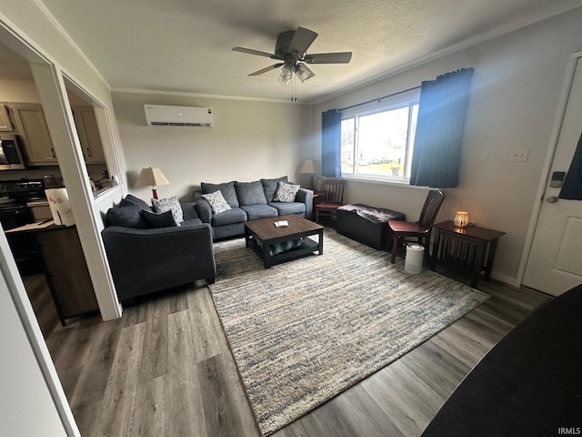 328 Barbie St, South Bend, IN 46614 - living area with crown molding, a ceiling fan, wood finished floors, a textured ceiling, and a wall unit AC
