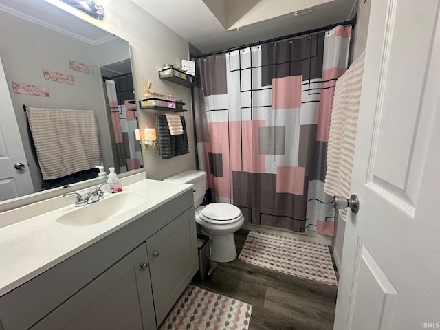 328 Barbie St, South Bend, IN 46614 - full bath featuring crown molding, wood finished floors, vanity, curtained shower, and toilet