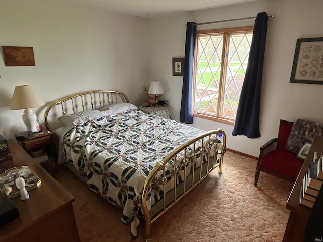 7976 W State Road 54, Switz City, IN 47465 - carpeted bedroom featuring baseboards