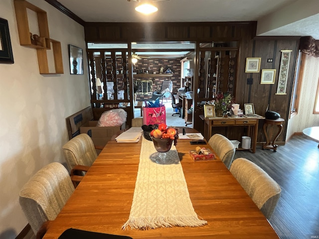 7976 W State Road 54, Switz City, IN 47465 - dining room featuring wood finished floors and wooden walls
