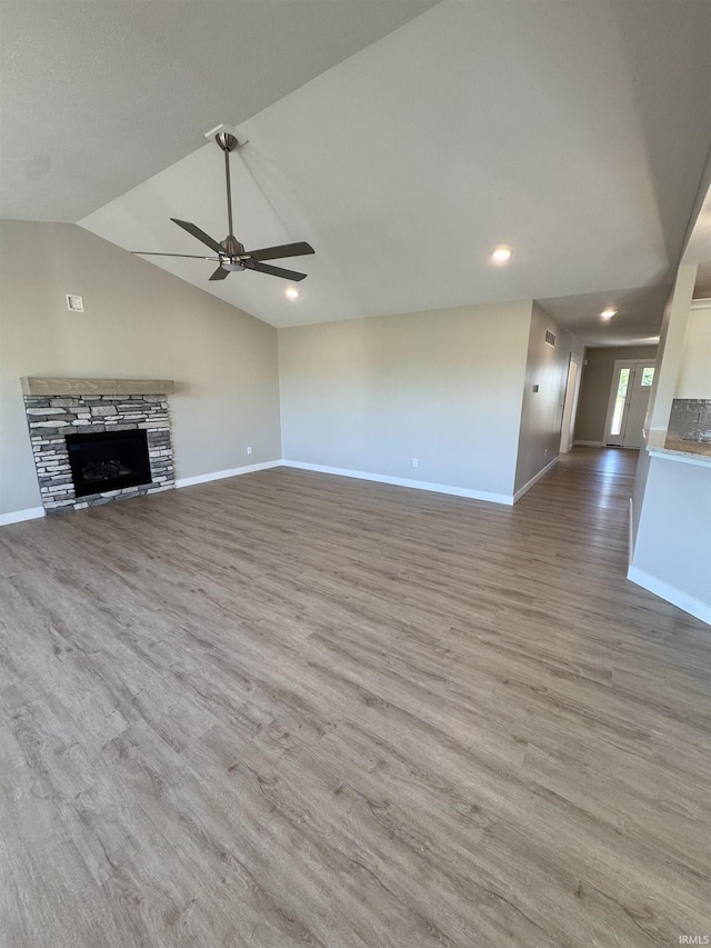 5115 Bankside Ct, Mishawaka, IN 46544 - unfurnished living room with wood finished floors, baseboards, a fireplace, ceiling fan, and recessed lighting