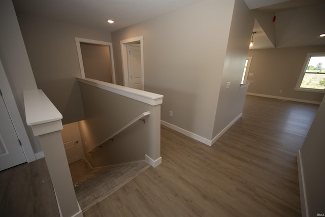 5115 Bankside Ct, Mishawaka, IN 46544 - corridor featuring an upstairs landing, baseboards, wood finished floors, and recessed lighting