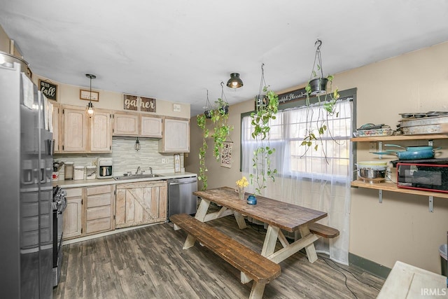 56626 Miller Dr, Elkhart, IN 46516 - kitchen featuring light countertops, tasteful backsplash, appliances with stainless steel finishes, and light brown cabinetry