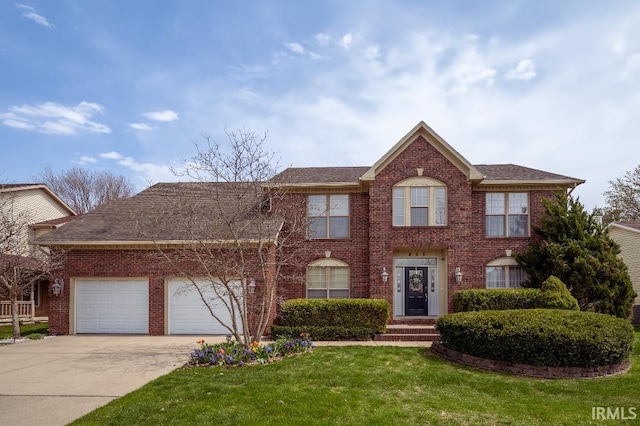 455 Lagrange St, West Lafayette, IN 47906 - view of front of home featuring concrete driveway, a front lawn, a shingled roof, a garage, and brick siding