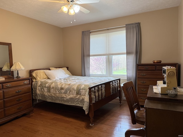 119 Leatherwood Creek Ests, Bedford, IN 47421 - bedroom featuring dark wood-type flooring and a ceiling fan
