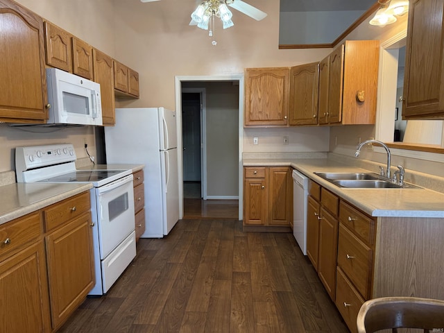 119 Leatherwood Creek Ests, Bedford, IN 47421 - kitchen featuring white appliances, dark wood-type flooring, a ceiling fan, light countertops, and a sink