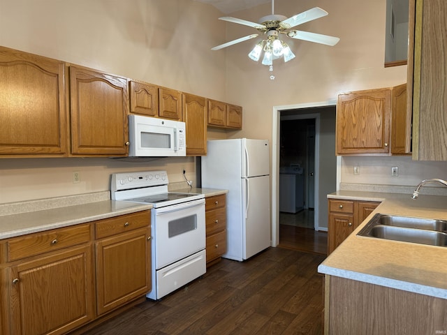 119 Leatherwood Creek Ests, Bedford, IN 47421 - kitchen featuring white appliances, a high ceiling, a ceiling fan, washer / dryer, and a sink