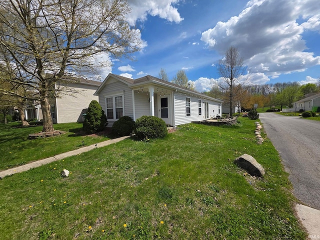 view of front of property with a front lawn